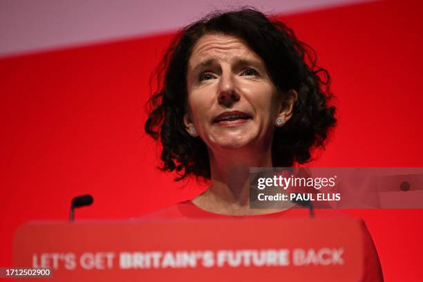 Britain's main opposition Labour Party chair Anneliese Dodds delivers a speech on the first day of the annual Labour Party conference in Liverpool,...