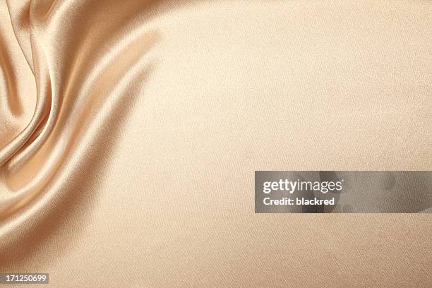 beige silk background - bruin stockfoto's en -beelden
