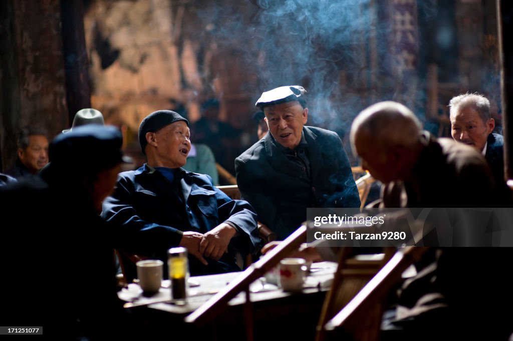 Senior people relaxing in traditional tea house, Chengdu, China