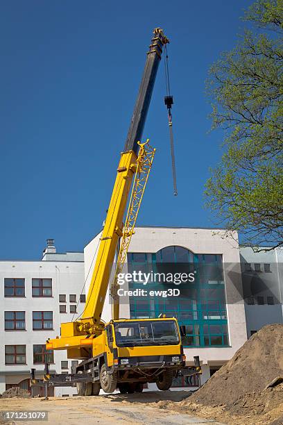 mobile crane in construction site - mobile crane stock pictures, royalty-free photos & images