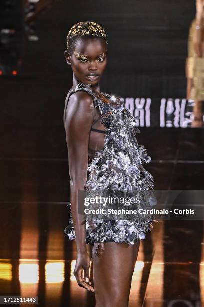 Model walks the runway during "Le Défilé L'Oréal Paris - Walk Your Worth" Show as part of Paris Fashion Week at the Eiffel Tower on October 01, 2023...