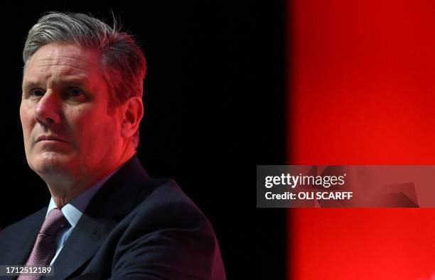 Britain's main opposition Labour Party leader Keir Starmer listens as Britain's main opposition Labour Party deputy leader and Shadow Levelling Up,...