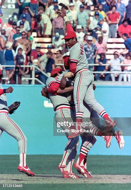 St. Louis Cardinals players celebrate playoff win over the Los Angeles Dodgers at Dodgers Stadium, October 16, 1985 in Los Angeles, California.