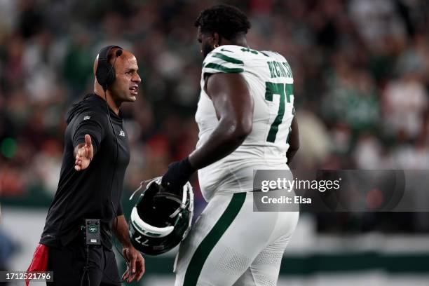 Head coach Robert Saleh of the New York Jets high-fives Mekhi Becton against the Kansas City Chiefs during the second quarter in the game at MetLife...