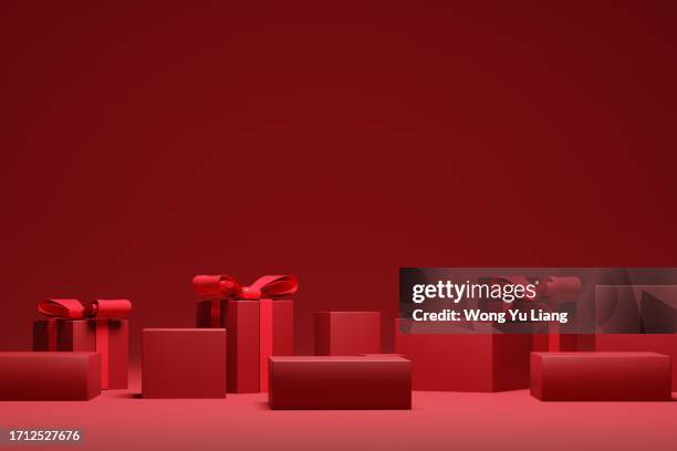 christmas red background with presents, 3d render - christmas gift fotografías e imágenes de stock