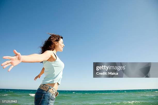 freedom - female 40 year old beach stock pictures, royalty-free photos & images