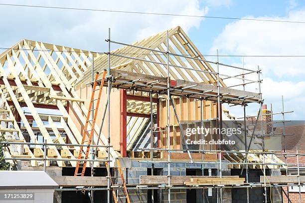 new house under construction - roof truss stock pictures, royalty-free photos & images