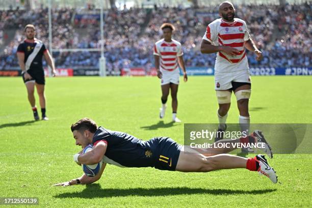 Argentina's left wing Mateo Carreras scores a try during the France 2023 Rugby World Cup Pool D match between Japan and Argentina at the Stade de la...