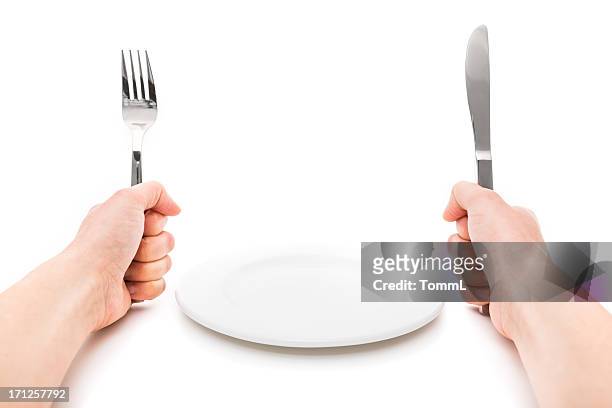 esfomeado - plate eating table imagens e fotografias de stock