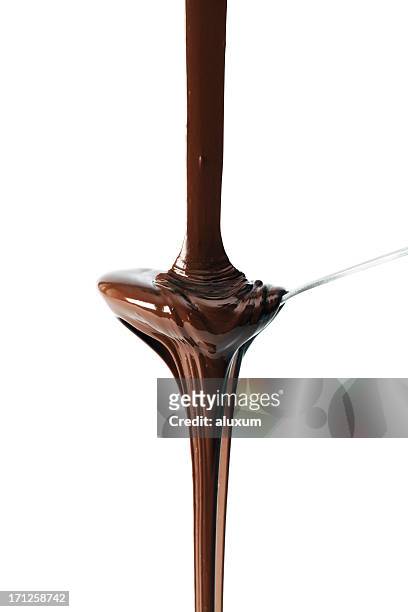 pouring chocolate - chocolate sauce stock pictures, royalty-free photos & images