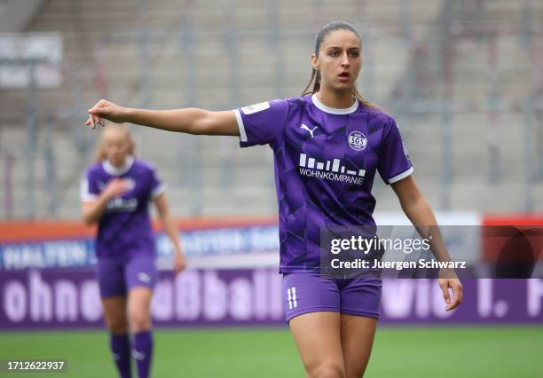 Laureta Elmazi of Essen lifts this arm during the Google Pixel Women's Bundesliga match between SGS Essen and FC Bayern Muenchen at Stadion an der...