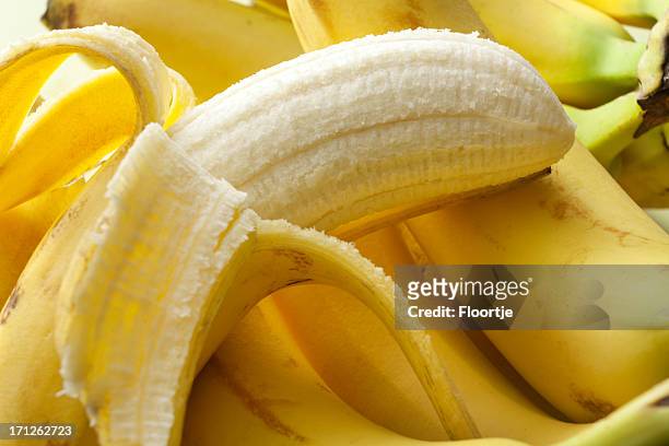 fruit stills: banana - peeled stock pictures, royalty-free photos & images