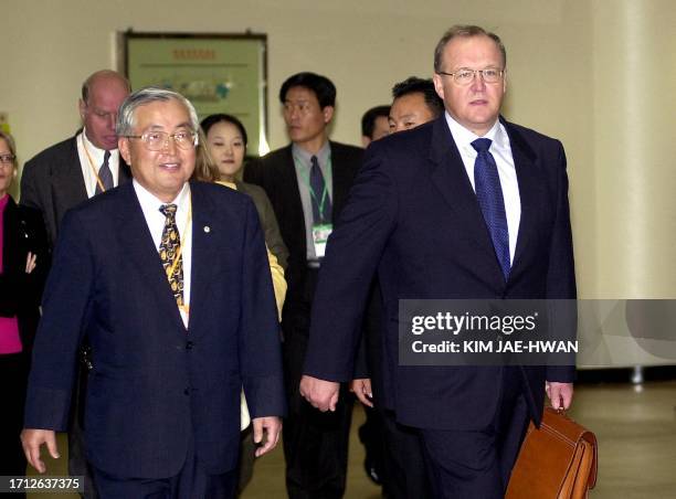 Swedish Prime Minister Goran Persson with ambassador Song Young-Sik as a representative of the South Korean government walk to the VIP lounge at...
