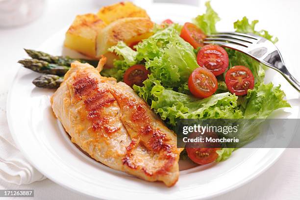 grilled chicken steak with potatoes,asparagus and salad - juicy stock pictures, royalty-free photos & images