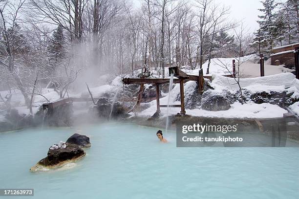 japanese spa - spring flowing water stock pictures, royalty-free photos & images