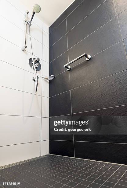 shower low angle view - slate tile stock pictures, royalty-free photos & images