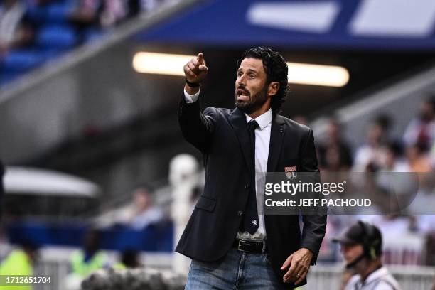 Lyon's Italian new head coach Fabio Grosso gestures during the French L1 football match between Olympique Lyonnais and FC Lorient at The Groupama...