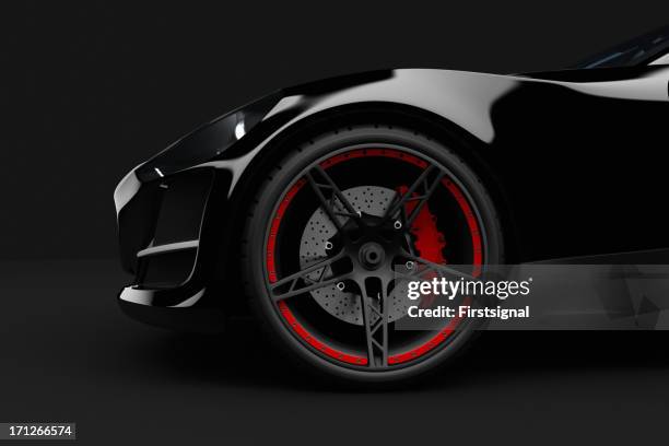 black sport car on dark background - wheel stock pictures, royalty-free photos & images