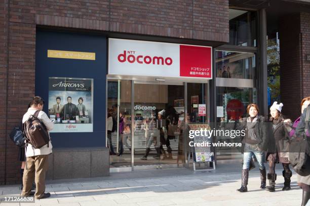 ntt docomo shop in japan - ntt docomo stock pictures, royalty-free photos & images