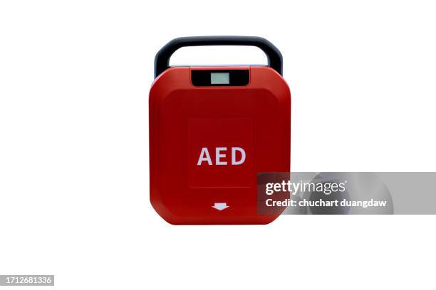 automated external defibrillator, (aed) on white background - desfibrilador fotografías e imágenes de stock