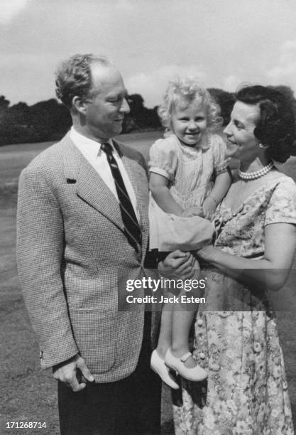 King Leopold III of Belgium and Princess Lilian of Belgium with their daughter Princess Marie-Christine of Belgium, in the grounds of the Royal...