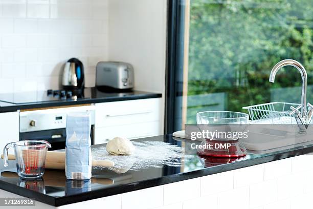 domestic kitchen during bread preparation - messy kitchen stock pictures, royalty-free photos & images