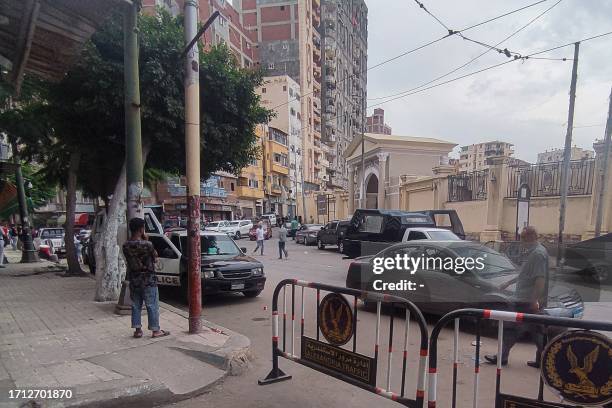 Egyptian police cordon off the site where a a policeman killed two Israeli tourists and one Egyptian in Alexandria on October 8, 2023. The policeman...