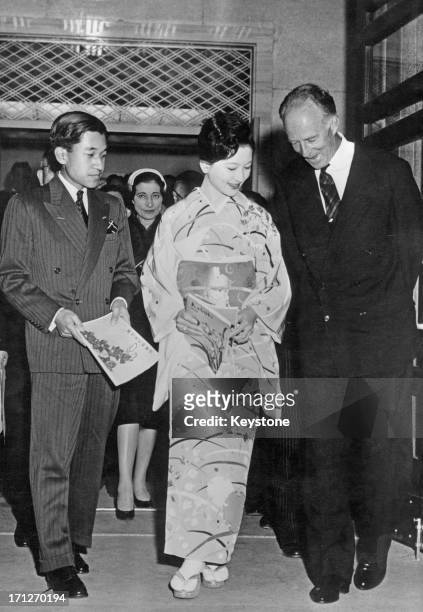 Ex-King Leopold III of Belgium arrives at the Kabuki Theatre accompanied by Crown Prince Akihito and Princess Michiko, Tokyo, Japan, 16th March 1961.