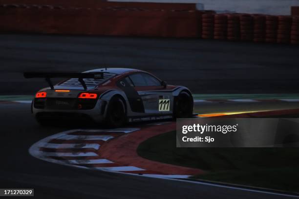 audi r8 lms race car at the race track - audi r8 stock pictures, royalty-free photos & images