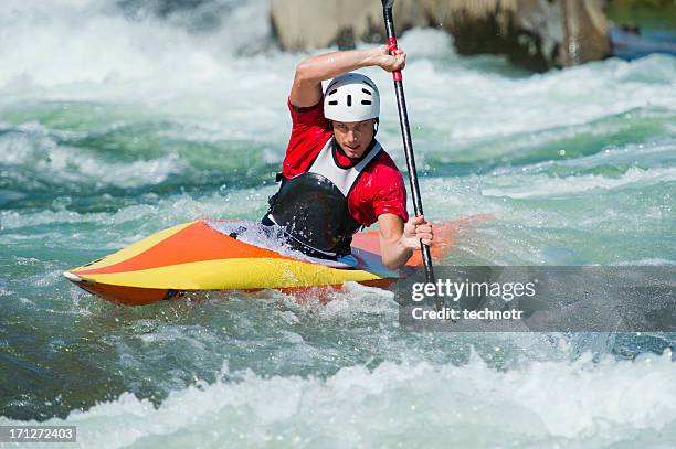 kayaker in red dress - kayaking rapids stock pictures, royalty-free photos & images