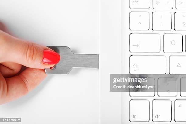 connecting usb flash drive in white laptop - ram stick stock pictures, royalty-free photos & images