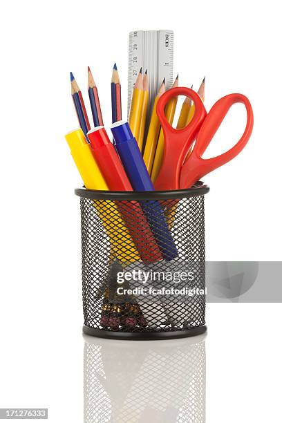 desk organizer filled with some school supplies on white backdrop - desk organizer stock pictures, royalty-free photos & images
