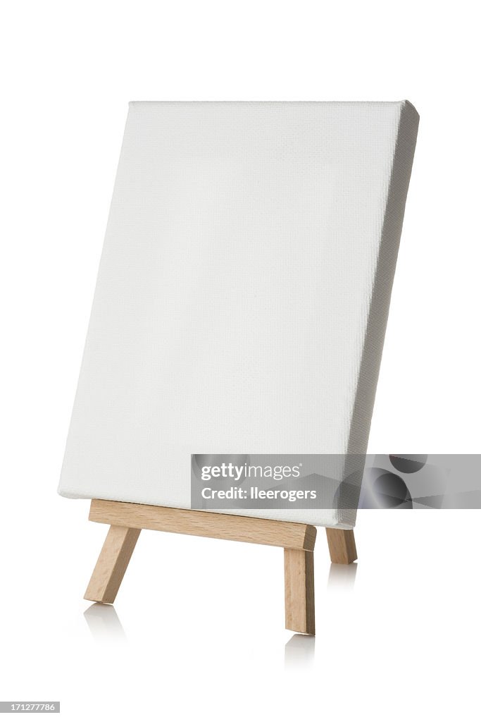 Blank canvas with wooden easel on a white background