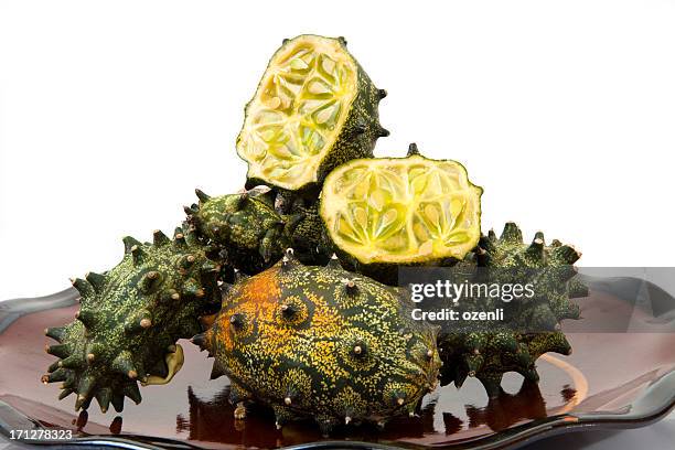kiwano fruit in dish - horned melon stock pictures, royalty-free photos & images