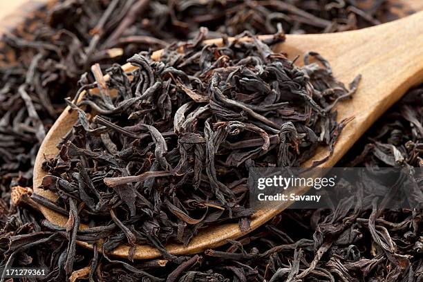 black tea - tea leaves stock pictures, royalty-free photos & images