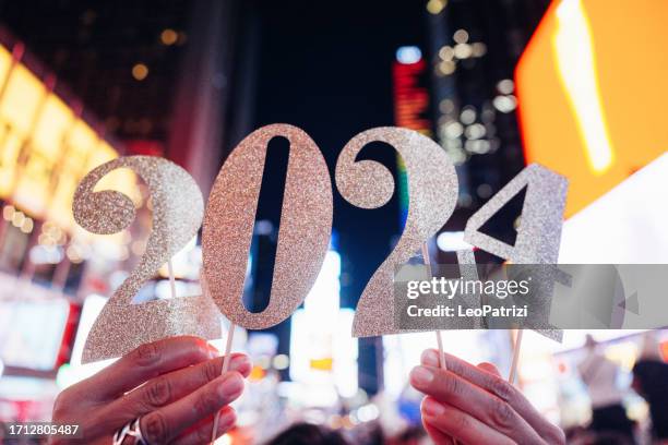 2024 new year celebrations in times square, new york - new years eve new york city stock pictures, royalty-free photos & images