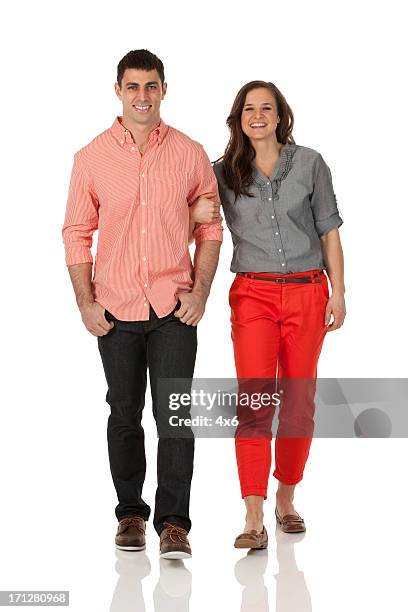 happy couple walking together - couple walk white background stock pictures, royalty-free photos & images