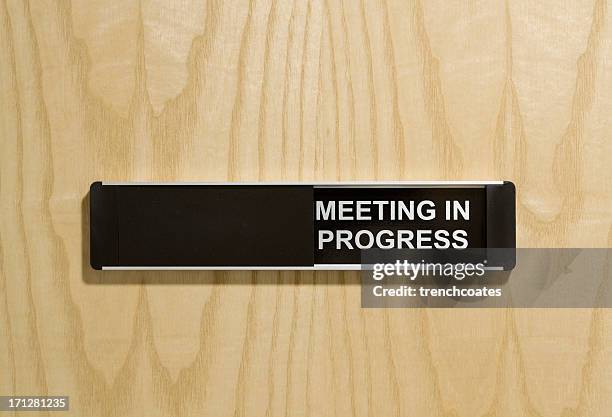 meeting in progress sign on office door - door sign stock pictures, royalty-free photos & images