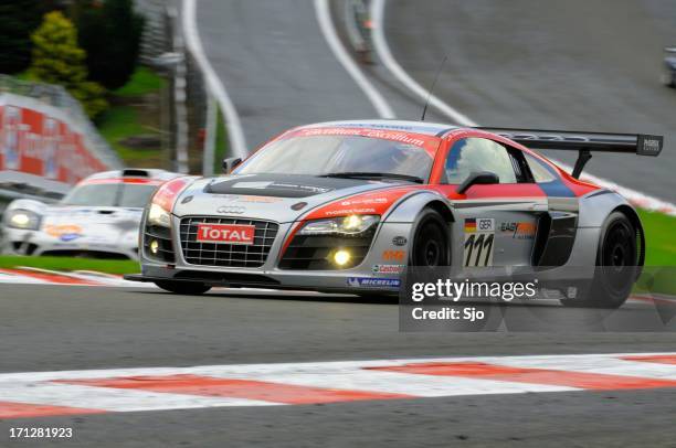 audi r8 lms race car at the race track - racing audi r8 stock pictures, royalty-free photos & images