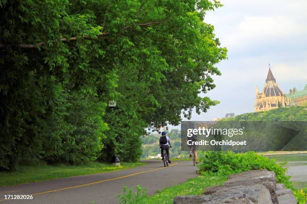 scenic cycling path - ottawa people stock pictures, royalty-free photos & images