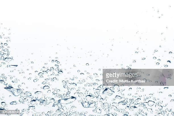 blue air bubbles rising in clear fresh water - underwater splash stock pictures, royalty-free photos & images