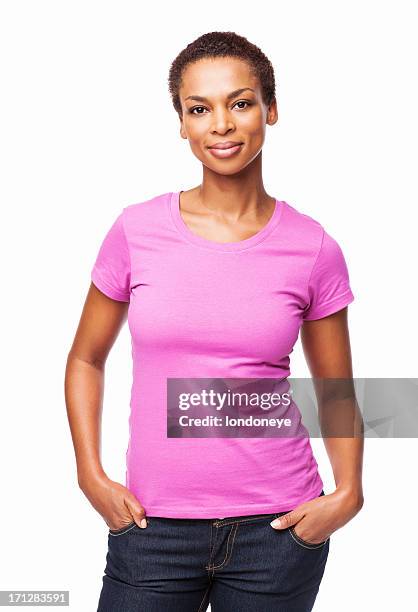 afroamerikanische frau lächelnd mit händen in den taschen-isoliert - african american man wearing shirt stock-fotos und bilder