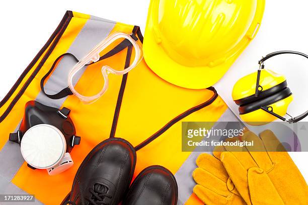 personal protective workwear shoot from above on white background - protective workwear stock pictures, royalty-free photos & images