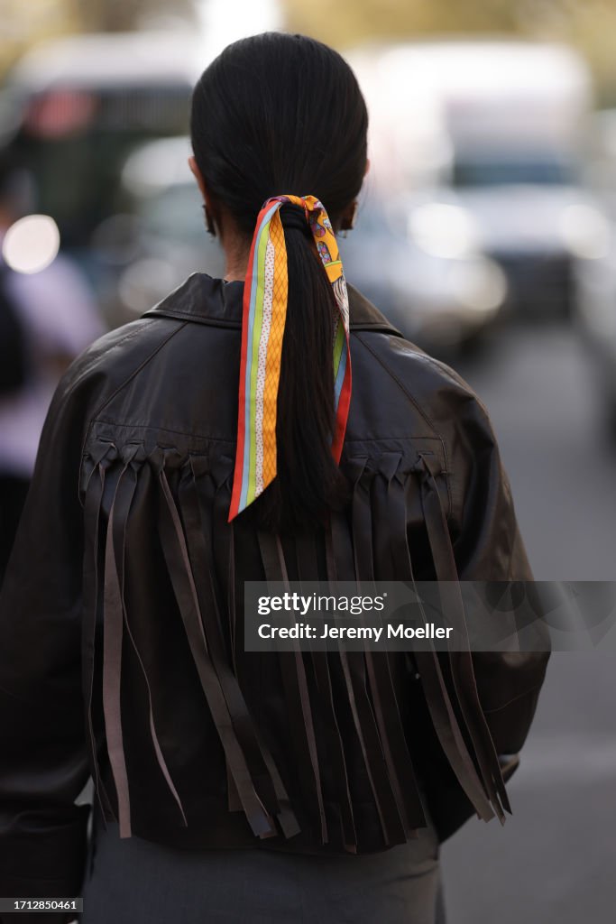 Street Style - Paris Fashion Week - Womenswear Spring/Summer 2024 - Day Six