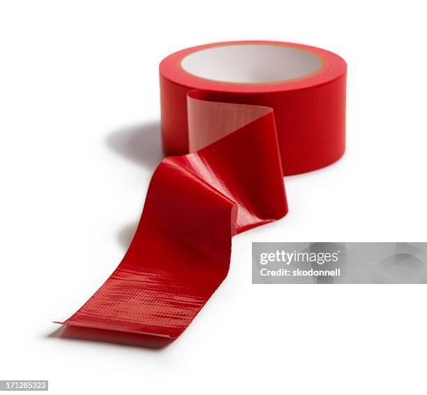 adhesive red tape isolated on white - duct tape stockfoto's en -beelden