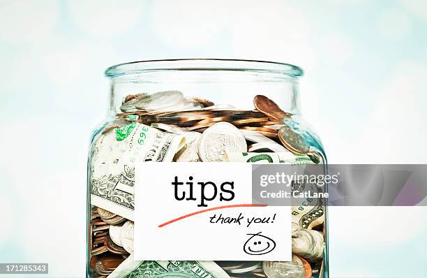 tip jar - tips jar stock pictures, royalty-free photos & images