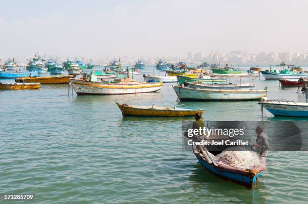 boats in alexandria harbor - alexandria egypt stock pictures, royalty-free photos & images