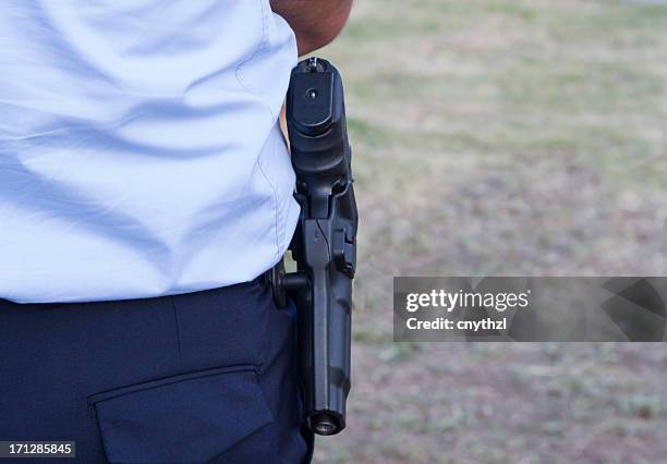 police gun - holster stock pictures, royalty-free photos & images