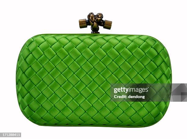 a green clutch handbag isolated on white - handväska bildbanksfoton och bilder
