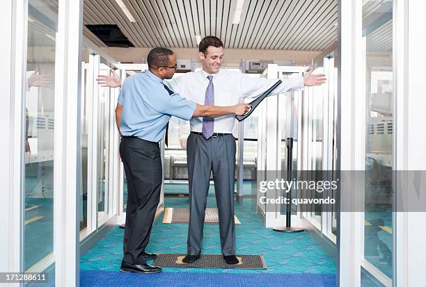 airport security check point - metal detector security stock pictures, royalty-free photos & images